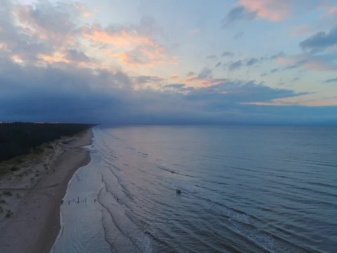 Empty beach Coastline with breaking waves on cloudy day Stock Footage 84296598
