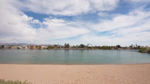 Empty Beach on Colorado River Big Bend With Laughlin Town in Background, Nevada Stock Footage 336635872