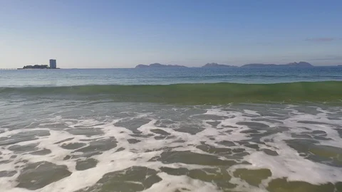 Empty beach drone footage of water in Samil Beach from Vigo Video stock 130121245