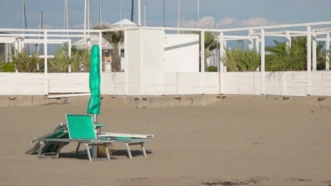 Empty beach full of umbrellas and sunbeds, Sardinia. Stock Footage 117466096