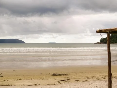 Empty beach landscape in heavy clouds day. Stock Photos