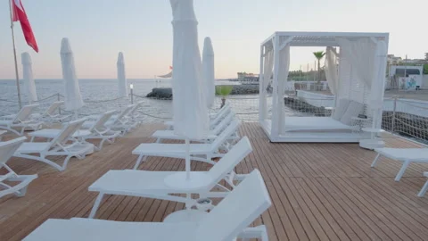Empty Beach Lounge Area at Sunset Stock Footage 282932791