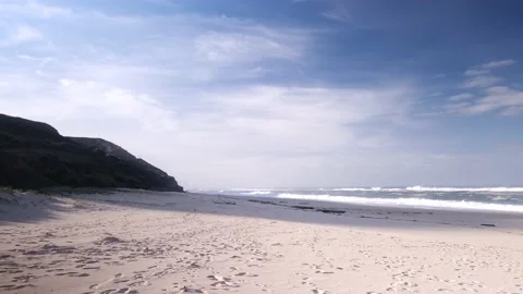 Empty beach, mountain and Atlantic Ocean Stock Footage 230098405