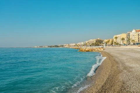 Empty beach in Nice and Promenade des Anglais Stock Photos
