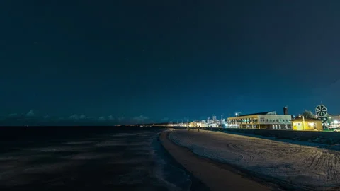 Empty Beach Promenade and Pavilion Under Stars at Night Stock Footage 342481538