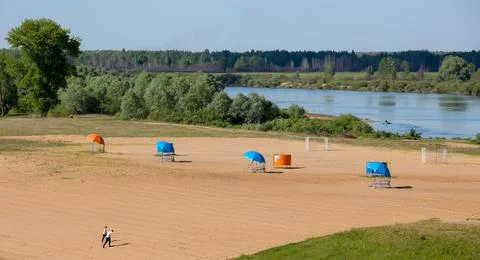 Empty beach by the river in eastern europe Stock Photos