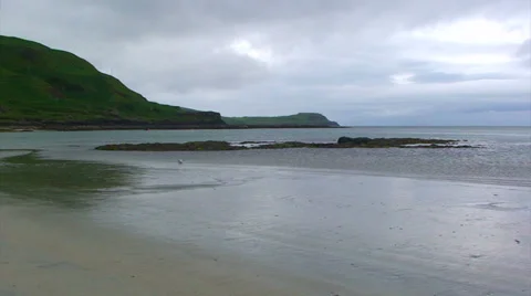 Empty beach in the Scottish Highlands on a cloudy summer day Stock Footage 39859396