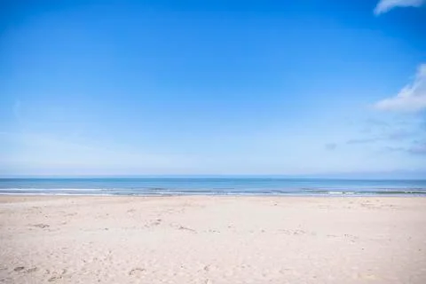 Empty beach by the sea in the summer Stock Photos