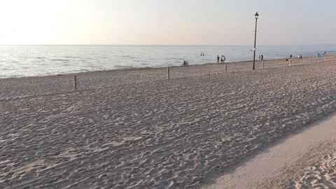 Empty beach on summer long holiday weeknd during COVID 19 pandemic Stock Footage 154544830