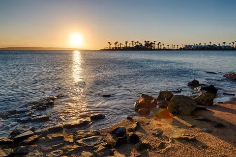 Empty beach at sunrise 스톡 사진
