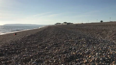 Empty beach on a sunset in England Stock Footage 130876454