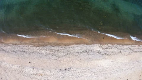 Empty beach. Top down, aerial view. The drone hovered over the coastline Stock Footage 106130975
