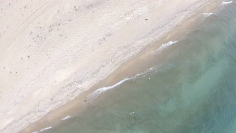 Empty beach. Top down, aerial view. Drone rotates Video stock 106202257