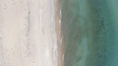 Empty beach. Top down, aerial view. Drone rise up above coastline Stock Footage 106202474
