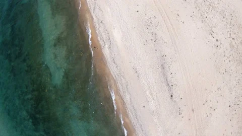 Empty beach. Top down, aerial view. Drone rotates Video stock 106276180