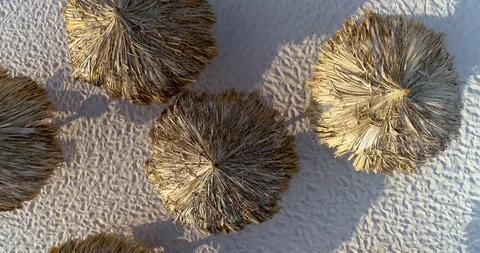 Empty beach top down view pan over beach gazebos on perfect  white beach Stock-Footage 104900615
