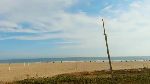 Empty Beach Volley Ball courts drive by Stock Footage 137272153