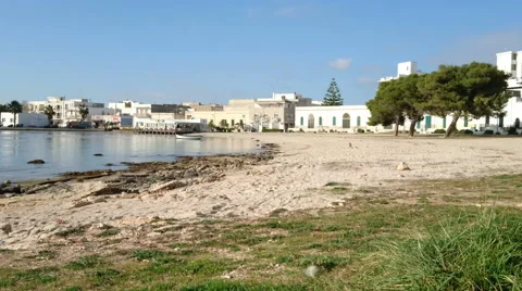 Empty beach in winter in Porto Cesareo, a famous tourist town in Italy Stock Footage 58845155