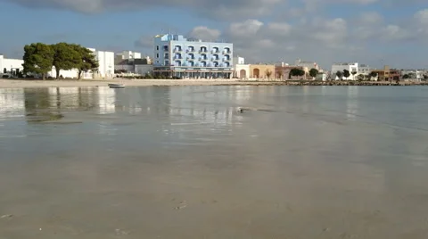 Empty beach in winter in Porto Cesareo, a famous tourist town in Italy Stock Footage 58845239