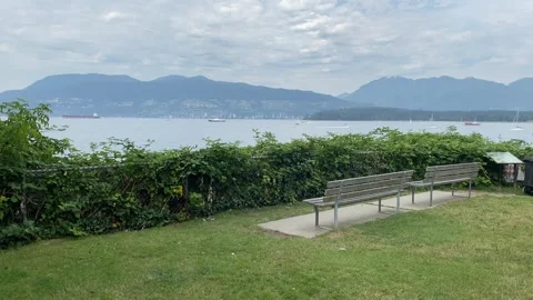 Empty beaches overlooking Vancouver mountain views Cloudy skies Stock Footage 280801502