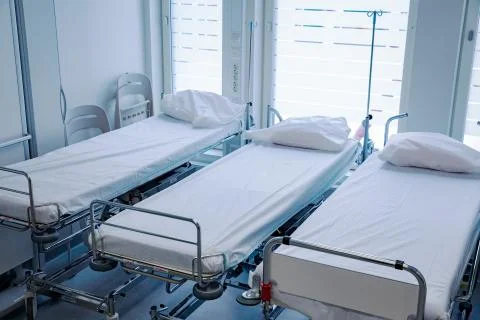 Empty bed in a hospital Stock Photos