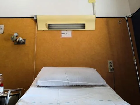 Empty bed in a hospital. Stock Photos