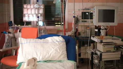 An empty bed in hospital ward. Electronic health monitoring equipment. Stock Footage 150122858