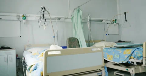 Empty bed in modern hospital Stock Footage 60799316