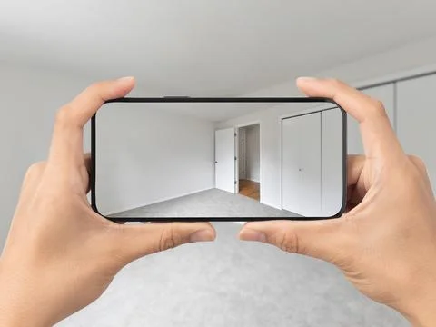 Empty bedroom with cell phone Stock Photos