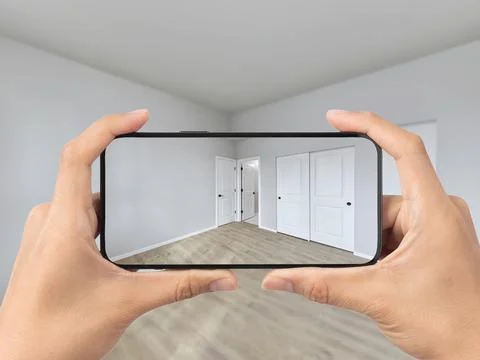 Empty bedroom with cell phone Stock Photos
