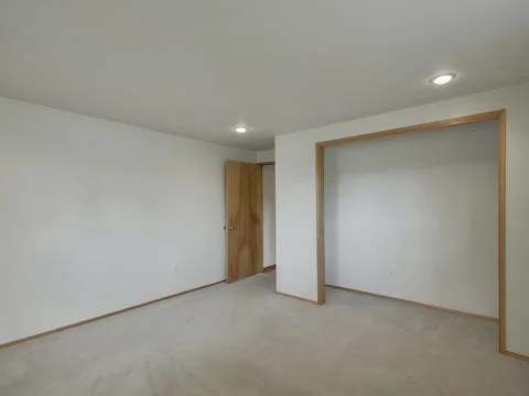 Empty bedroom interior Stock Photos