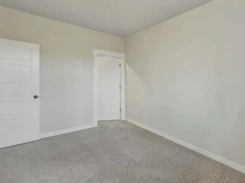 Empty bedroom interior Stock Photos