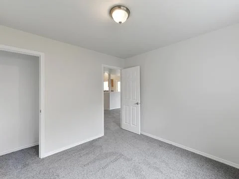 Empty bedroom interior Stock Photos