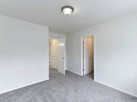 Empty bedroom interior Stock Photos