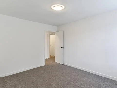 Empty bedroom interior Stock Photos