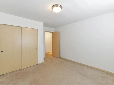 Empty bedroom interior Stock Photos