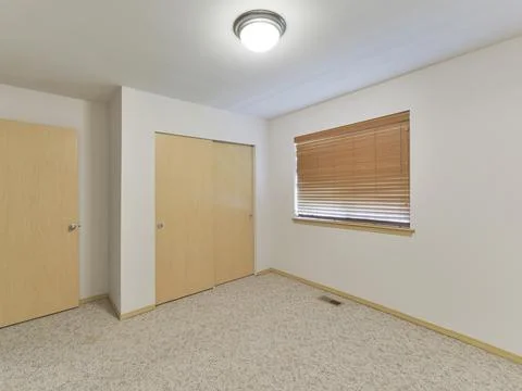 Empty bedroom interior Stock Photos