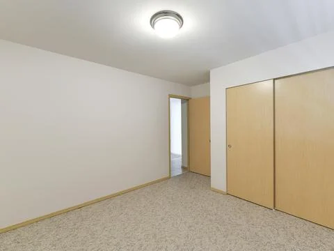 Empty bedroom interior Stock Photos