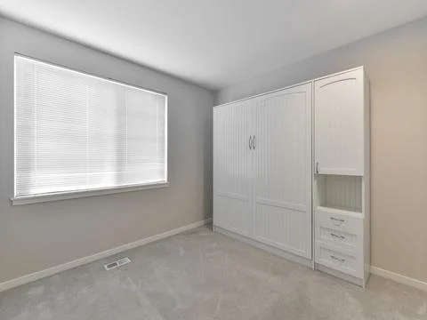 Empty bedroom interior Stock Photos