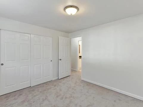 Empty bedroom interior Stock Photos