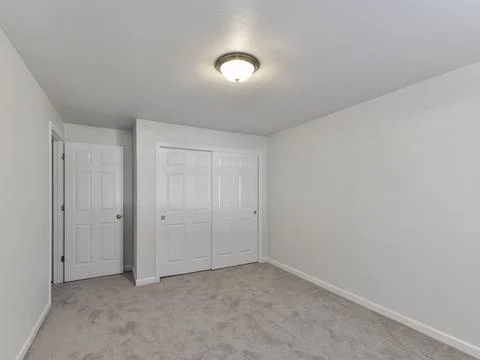 Empty bedroom interior Stock Photos