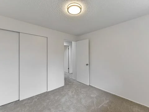 Empty bedroom interior Stock Photos