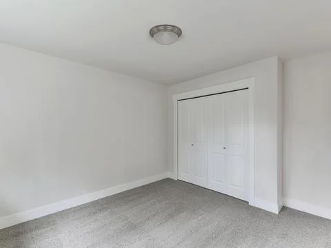 Empty bedroom interior Stock Photos