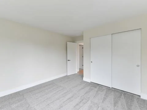 Empty bedroom interior Stock Photos