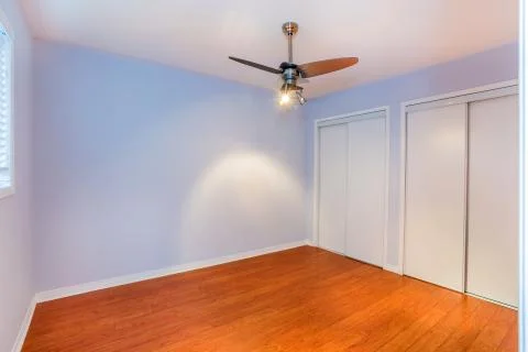 Empty bedroom in a new apartment Stock Photos