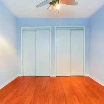 Empty bedroom in a new apartment Stock Photos