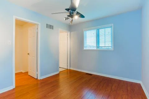 Empty bedroom in a new apartment Stock Photos