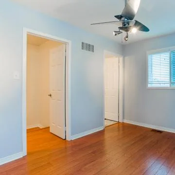 Empty bedroom in a new apartment Stock Photos