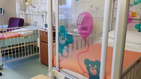 Empty beds in a paediatric ward in a UK hospital Stock Footage 163488615