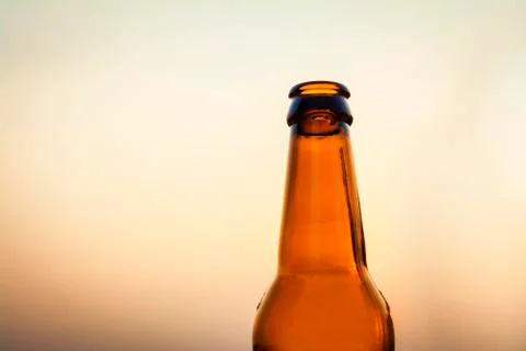 Empty beer bottle isolated Stock Photos